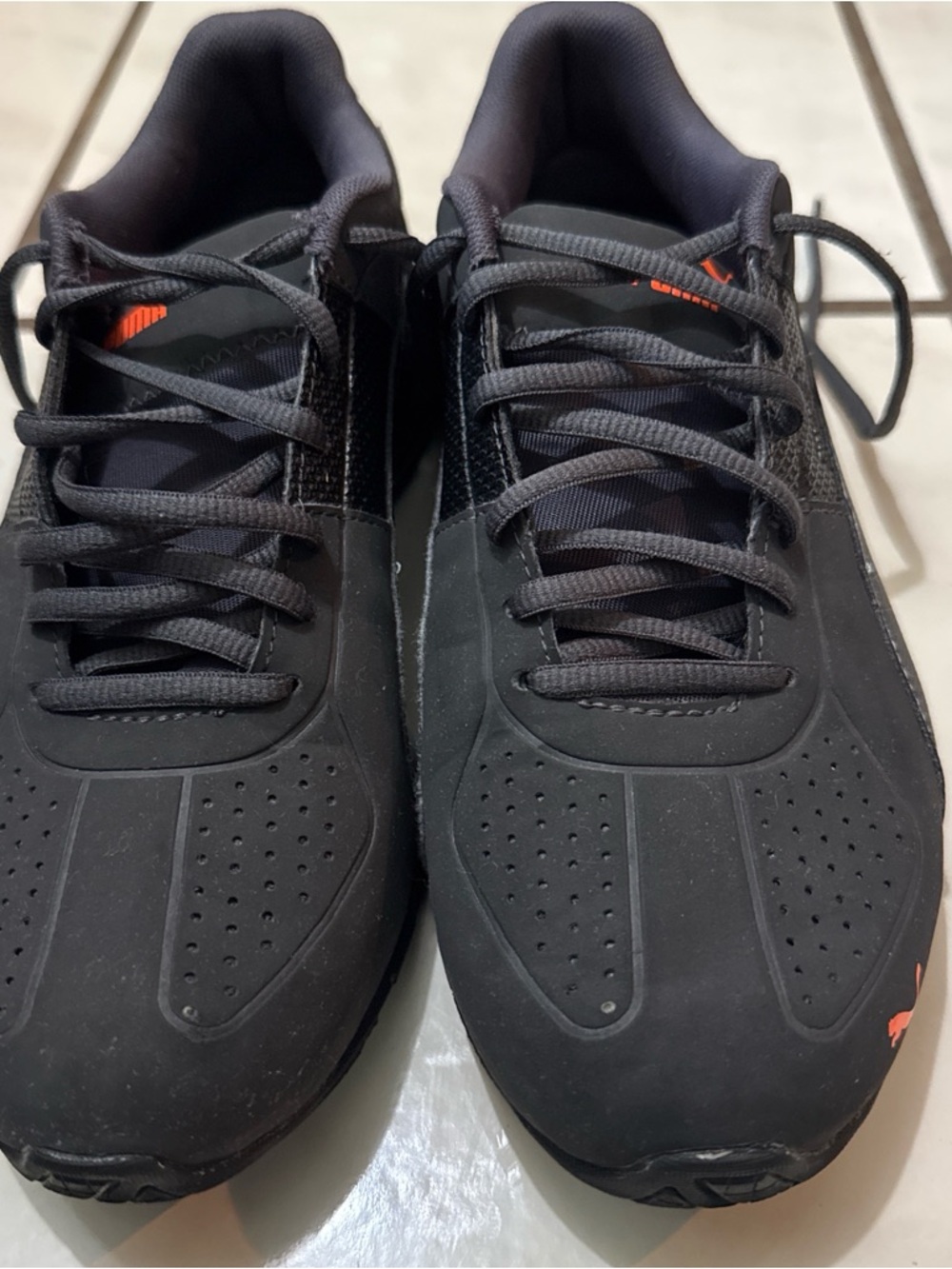 Puma Men’s Black Sneakers with Orange Logo Accent